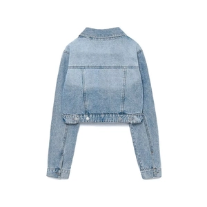 Back view of light blue cropped denim jacket with button hem detailing and stitching