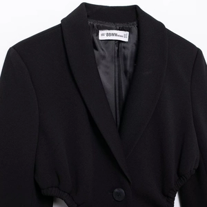 Women's black shawl lapel blazer featuring twill texture and waist pleat detail