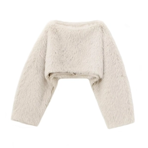 Detailed view of the soft faux fur texture and smooth lining on this cropped shrug