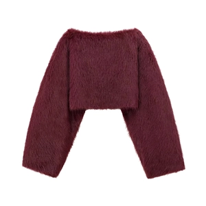 Close-up of fluffy faux fur texture in burgundy on women's cropped autumn top