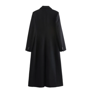 Rear view of a stylish black wool blend long coat with a tailored waist and flared hem