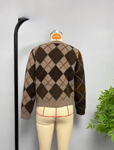 Detail of argyle knit sweater back view in brown tones on a mannequin for stylish look