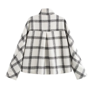 Women's black and white checkered plaid jacket with a stand collar and back pleat detail