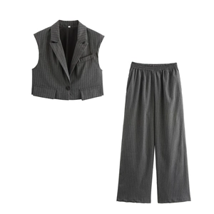 Detailed flat lay of dark grey pinstripe vest and wide-leg trousers two-piece set