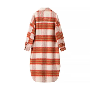 Back view of a long plaid shacket in red and olive green with a curved hemline