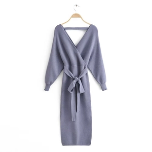 Mauve V-neck knit midi dress with batwing sleeves and waist tie on a wooden hanger