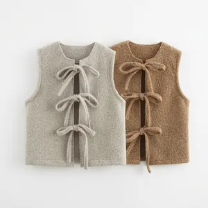 Women's autumn wool blend vest coat with three bow tie closures in grey and brown