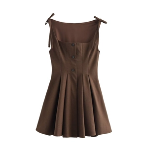 Brown plaid sleeveless dress with adjustable tie straps and pleated A-line skirt
