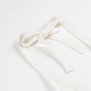 White halter neck knit vest for women with textured waffle fabric and bow tie design