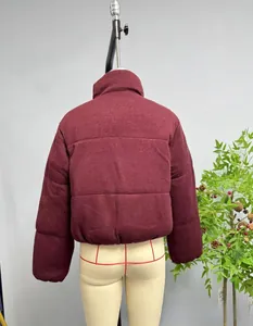Rear view of wine red puffer jacket with horizontal quilting and a high stand collar