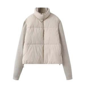 Women's chic beige puffer vest with knit sleeves and drawstring hem for autumn