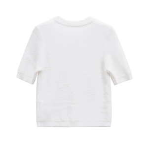 Minimalist white short sleeve knit sweater with soft mohair texture and round neckline
