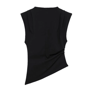Detail view of black sleeveless top with shoulder pleats and asymmetric hemline