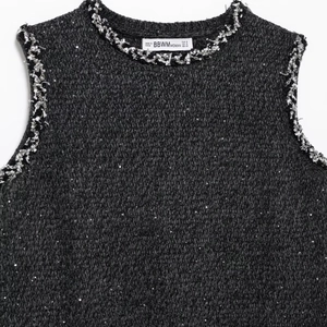 Women's dark gray sleeveless knit dress with silver sequins and tweed trim detail