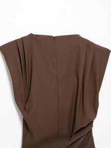 Detail of dark brown top with invisible back zipper and ruched shoulder pleats texture