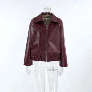 Detail view of burgundy PU leather jacket featuring classic lapel and front metal zipper
