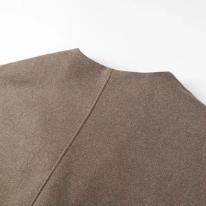 Women's V-neck brown wool blend coat featuring soft texture and vertical back seam detail