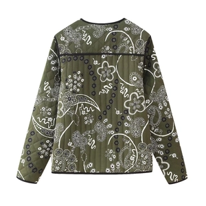 Rear view of an olive green quilted jacket with white paisley floral patterns and black trim