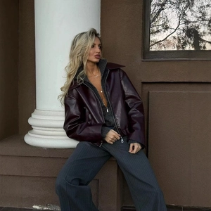 Chic burgundy faux leather jacket for women featuring a zip-up design and oversized lapels