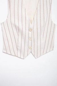 Close-up of beige cotton-linen vest featuring red vertical stripes and wood buttons