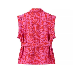 Women's streetwear fashion vest with bold floral paisley print and matching waist belt