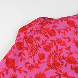 Chic rose pink vest with vintage floral print and classic lapel collar detail