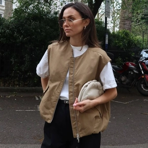 Fashionable khaki V-neck outdoor vest with silver zipper and large pockets for women
