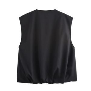 Detail view of the back of a black minimalist sleeveless vest with a hem drawstring design