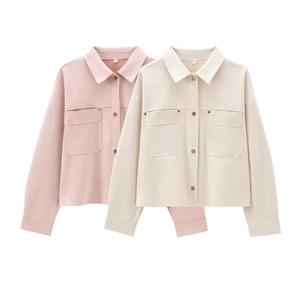 Detail of pink and beige suede jackets featuring flap pockets and metal buttons