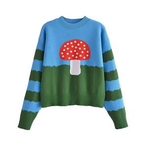 Women's crewneck knit sweater with blue and green panels and mushroom pattern