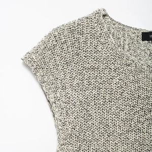 Women's crewneck knit vest in black and white melange cotton with thick ribbed texture