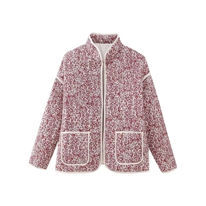 Detail of burgundy floral quilted cotton jacket with mandarin collar and large pockets