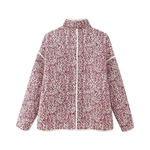 Close-up back view of floral quilted jacket with burgundy base and off-white trim