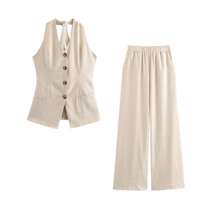 Women's chic beige cotton linen set featuring a halter tie top and wide leg trousers
