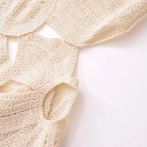Fashionable halter knit hollow out vacation dress in elegant cream white crochet pattern