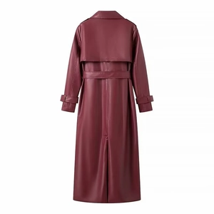 Back view of a long burgundy leather trench coat with waist belt and storm flap detail