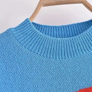 Blue crewneck knit sweater for women with refined ribbing and fine stitch texture details