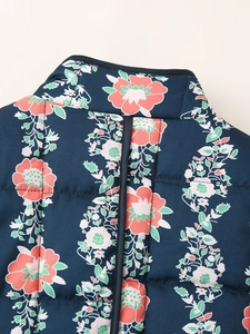 Close-up of quilted floral jacket featuring intricate patterns and high-quality stitching