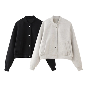 Close-up of ribbed knit collar and silver snap buttons on casual bomber jackets