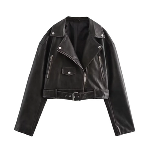 Close-up of black biker jacket with silver zippers, metallic snaps and adjustable belt