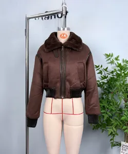 Detail of vintage faux fur collar and windproof strap on dark brown jacket