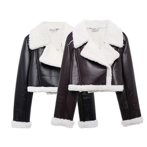 Detail view of chic faux leather biker jackets with warm lamb wool lapels and cuffs