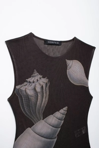 Close-up of black sheer mesh bodysuit featuring vintage shell and conch print details