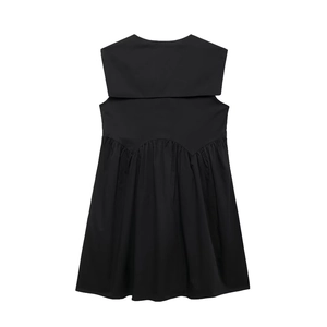 Detail of black sleeveless dress showing the sailor collar and high-quality woven fabric