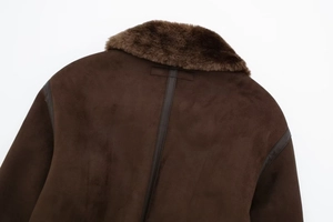 Detail of dark brown faux suede jacket back with plush fur collar and seam piping