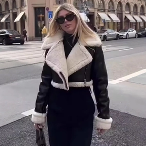 Women's faux leather biker jacket with contrasting white shearling collar and cuffs