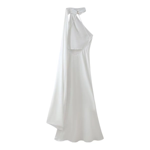 Detail of elegant white satin halter neck dress with metallic buckle and long ribbon