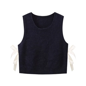 Women's knit vest in black with elegant side ribbon bow details and textured round neck
