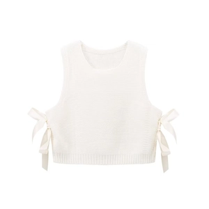 Women's white sleeveless knit vest featuring side silk bow ties and a chic crew neck style