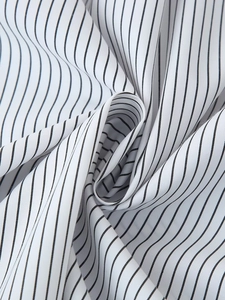 Macro detail of high-quality black and white striped cotton blend fabric texture